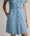 Model is wearing UNTUCKit Renee denim dress.