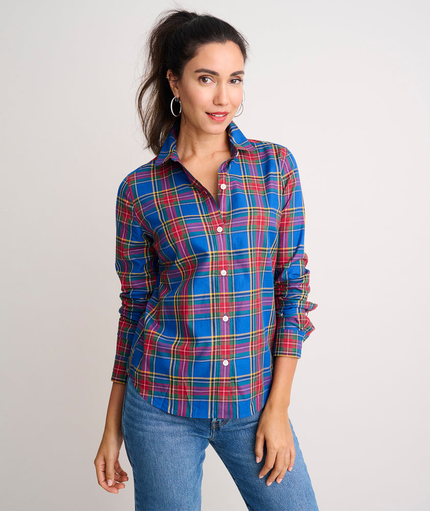 Model is wearing UNTUCKit Sadie shirt in blue plaid.