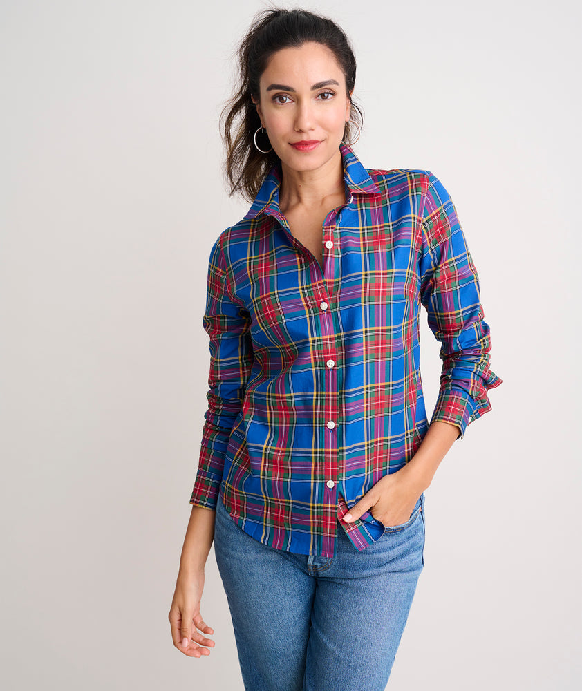 Model is wearing UNTUCKit Sadie shirt in blue plaid.