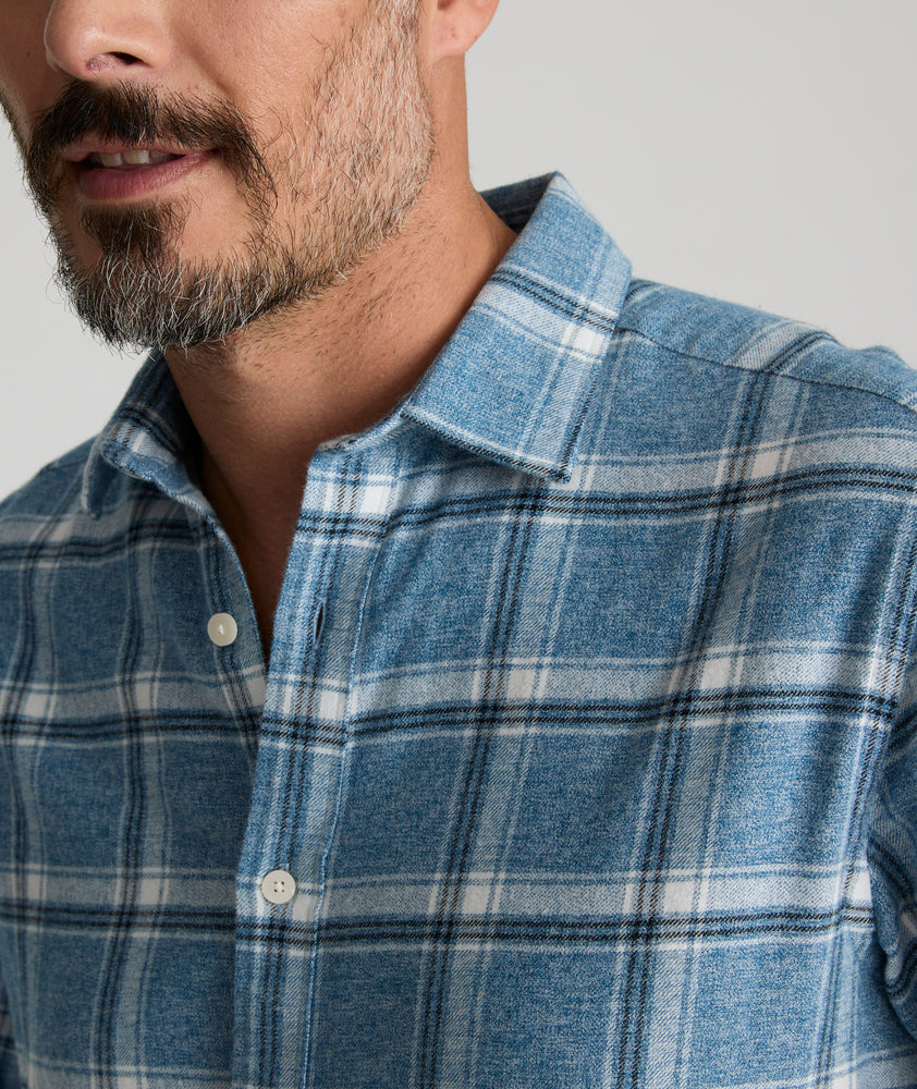 Model is wearing UNTUCKit Flannel Salentino Shirt in Light Blue Heathered Plaid.