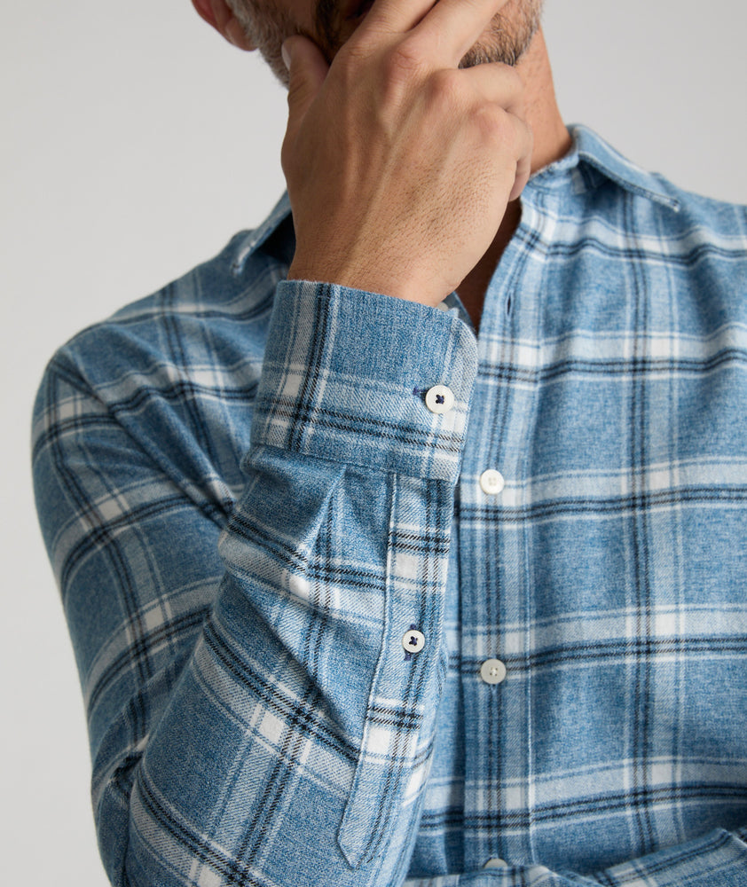 Model is wearing UNTUCKit Flannel Salentino Shirt in Light Blue Heathered Plaid.