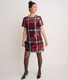 Model is wearing UNTUCKIt Short-Sleeve Sequin Plaid Sasha Dress.