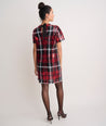 Model is wearing UNTUCKIt Short-Sleeve Sequin Plaid Sasha Dress.