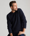 Model is wearing UNTUCKit Seaver Textured Crewneck in Sky Captain.