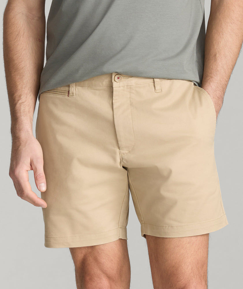 Model wearing UNTUCKit Tan 7" Chino Shorts.