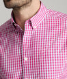 Model is wearing UNTUCKit Thorton wrinkle-free shirt in red. 