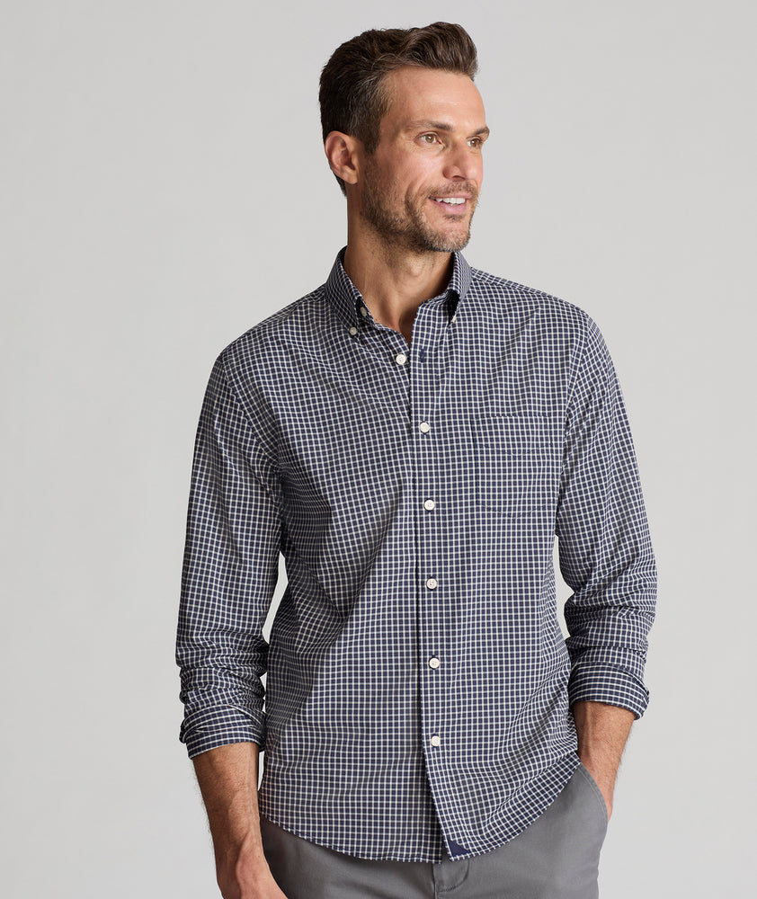 Model is wearing UNTUCKit Wrinkle-Free Performance Tully Shirt inNavy & Red Check.