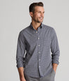 Model is wearing UNTUCKit Wrinkle-Free Performance Tully Shirt inNavy & Red Check.