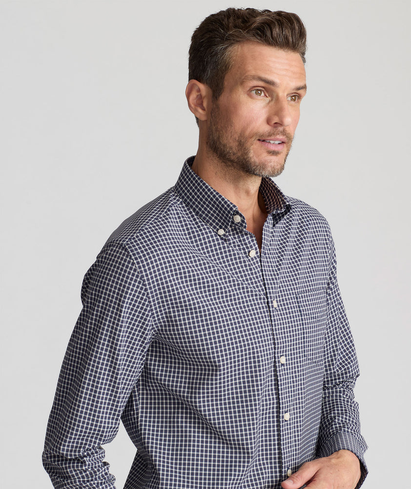 Model is wearing UNTUCKit Wrinkle-Free Performance Tully Shirt inNavy & Red Check.