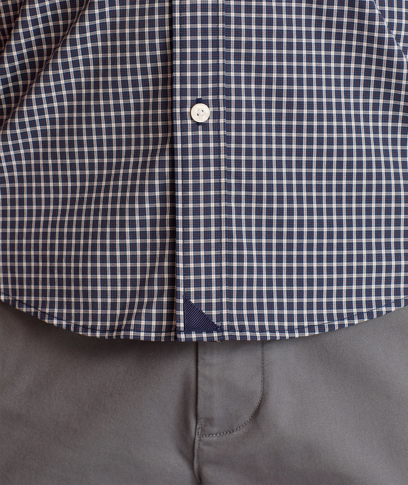 Model is wearing UNTUCKit Wrinkle-Free Performance Tully Shirt inNavy & Red Check.