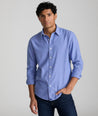 Model is wearing UNTUCKit Wrinkle-Free Veneto Shirt in light blue.