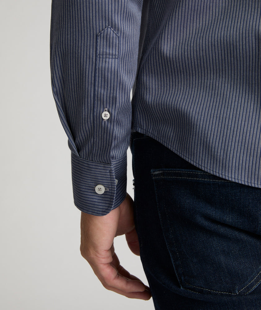 Model is wearing UNTUCKit Villard long-sleeve button down.