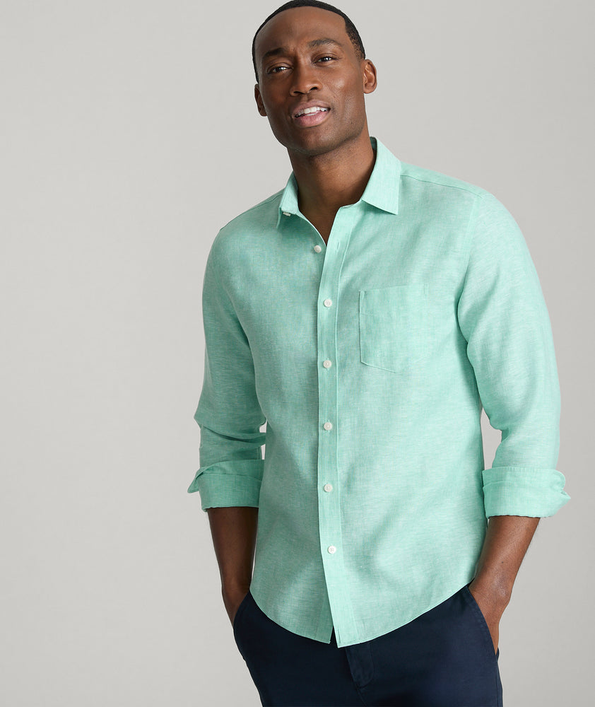 Model is wearing UNTUCKit Vin Santo in mint green. 