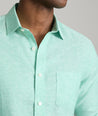 Model is wearing UNTUCKit Vin Santo in mint green. 