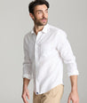 Model wearing an UNTUCKit Bright White Wrinkle-Resistant Linen Vin Santo Shirt