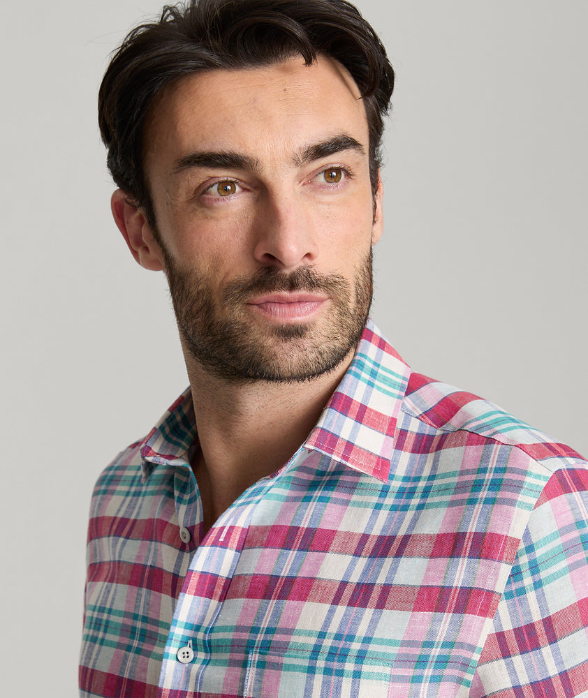 Model is wearing UNTUCKit linen red check wallace. 