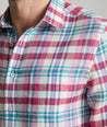 Model is wearing UNTUCKit linen red check wallace. 