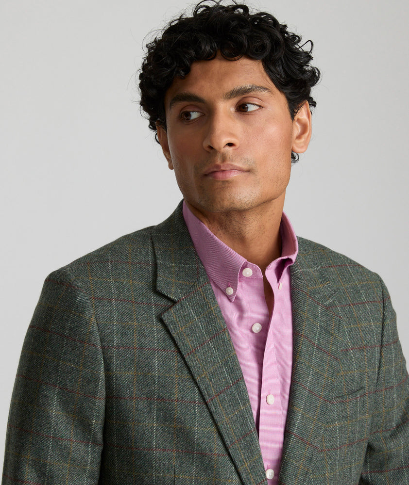  Model is wearing UNTUCKit Italian Wool Windsteig Sport Coat in Olive & Multicolor Windowpane.