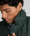 Model is wearing UNTUCKit Wynnwood Jacket in Green.