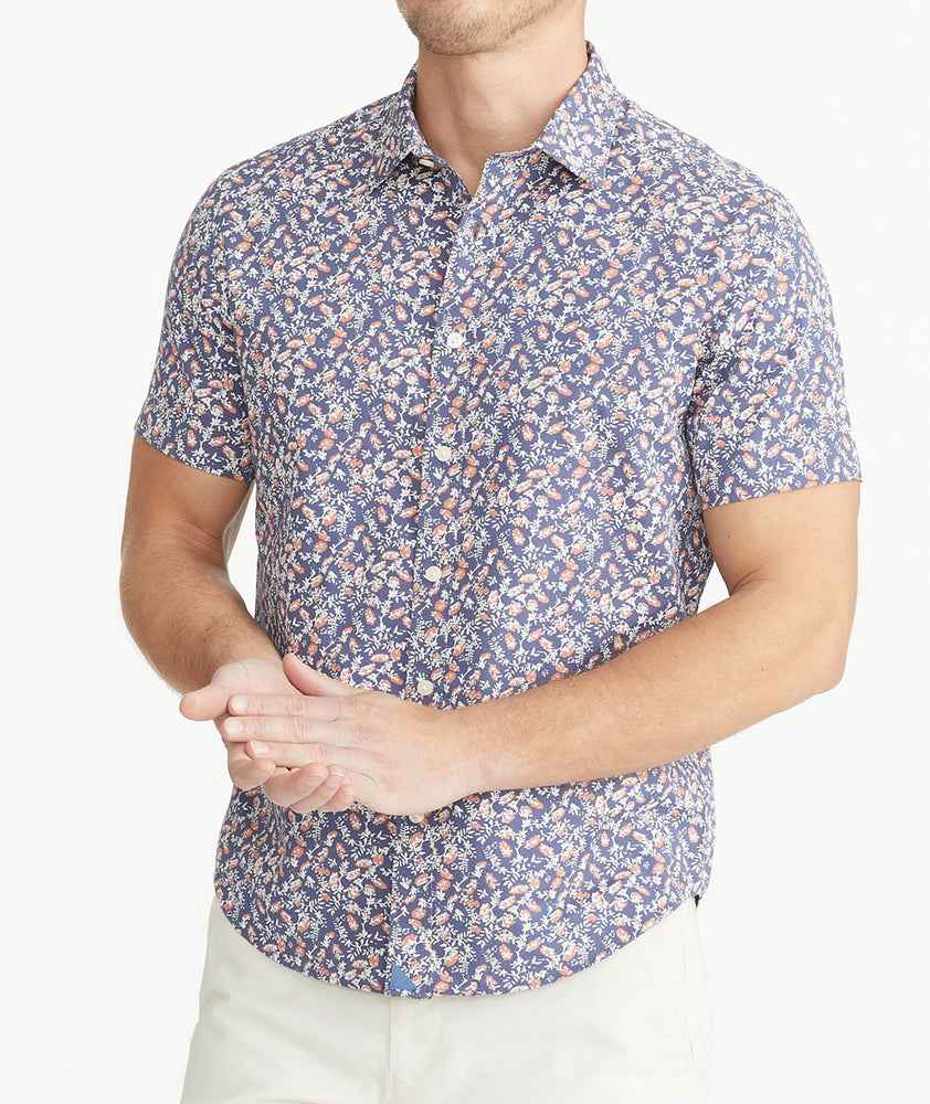 Model is wearing UNTUCKit Navy Cotton Short-Sleeve Buckley Shirt