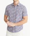 Model is wearing UNTUCKit Navy Cotton Short-Sleeve Buckley Shirt