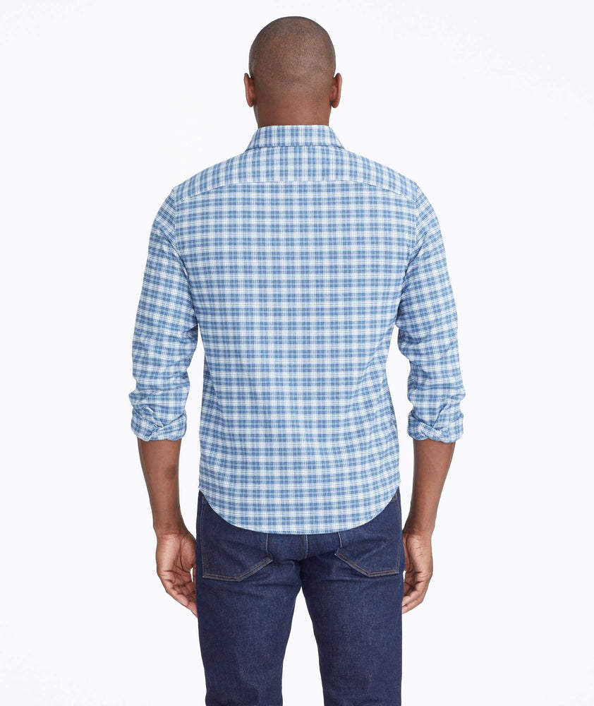 Model wearing a Blue Wrinkle-Free Performance Flannel Dhais Shirt