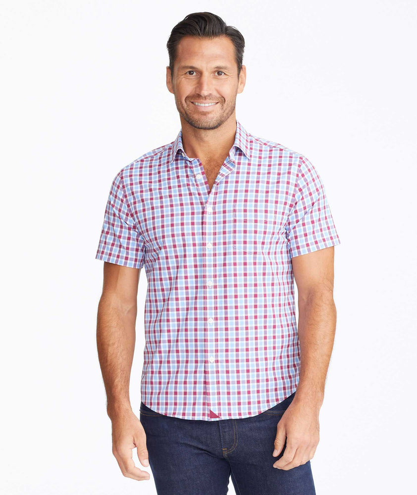 Model wearing a Light Blue Wrinkle-Free Performance+ Short-Sleeve Hopler Shirt