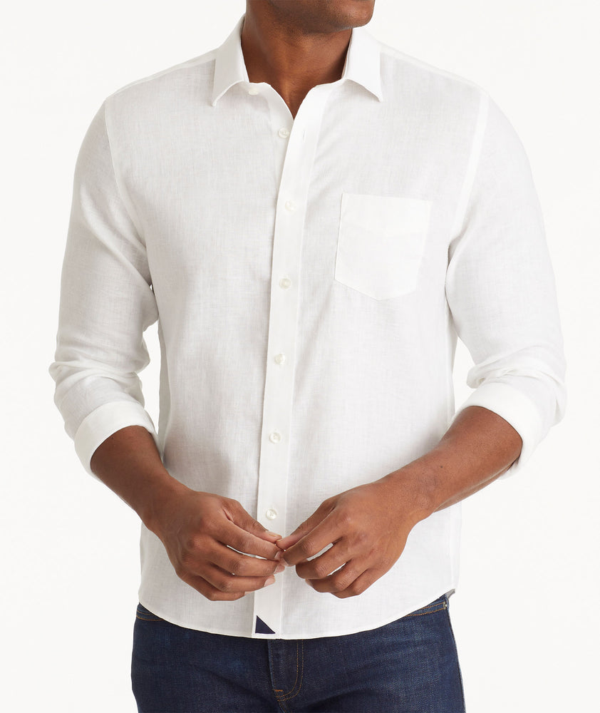 Model wearing an UNTUCKit Bright White Wrinkle-Resistant Linen Vin Santo Shirt